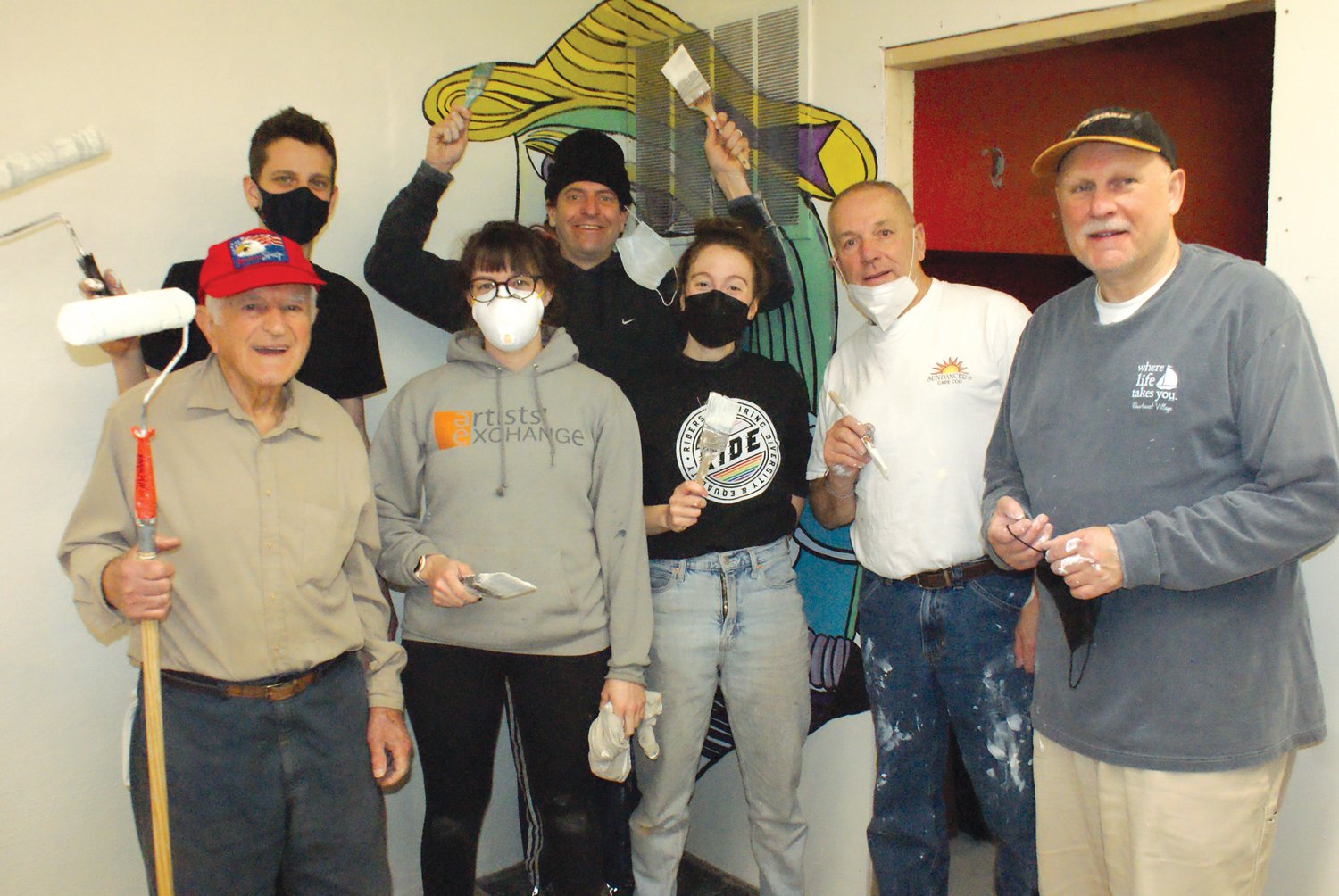 PRE-GAMING: What better way to spend a snowy Super Bowl Sunday but to volunteer
to make improvements at the Artists’ Exchange? That is how local Rotarians and employees
at the Artists’ Exchange spent it. Director Shannon Casey was joined by (back
row) Tom Glasgow and Max Pratt, Lou Marciano, Kaitlyn Cirielli, Roy Evans and Adrian
Beaulieu.